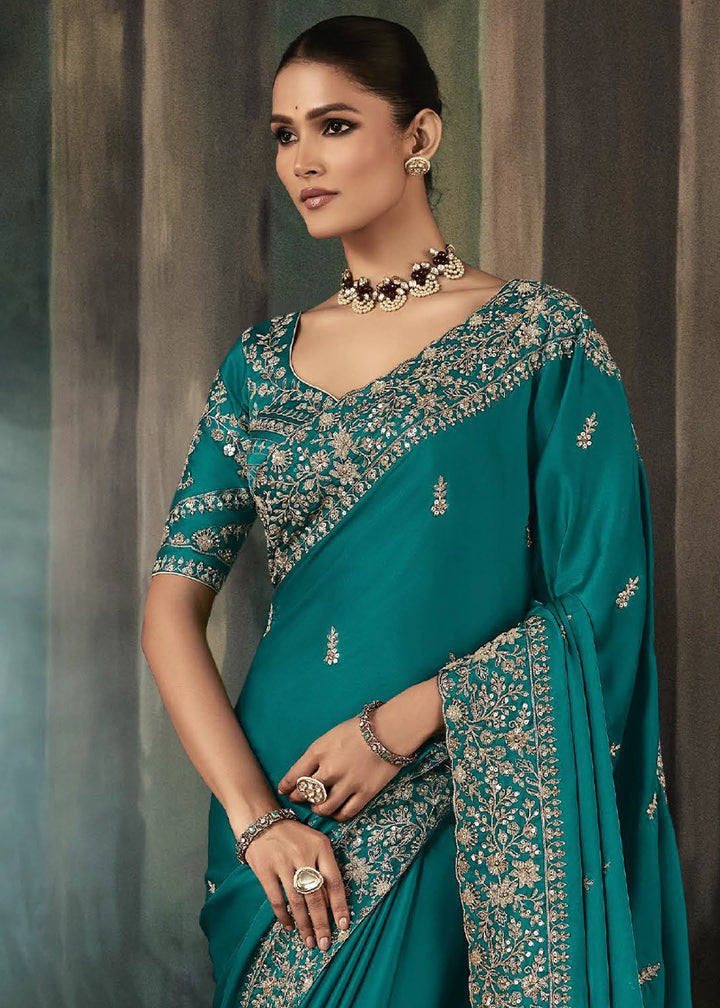 Cyan Blue Embroidered Satin Crepe Saree with Aari Detailing