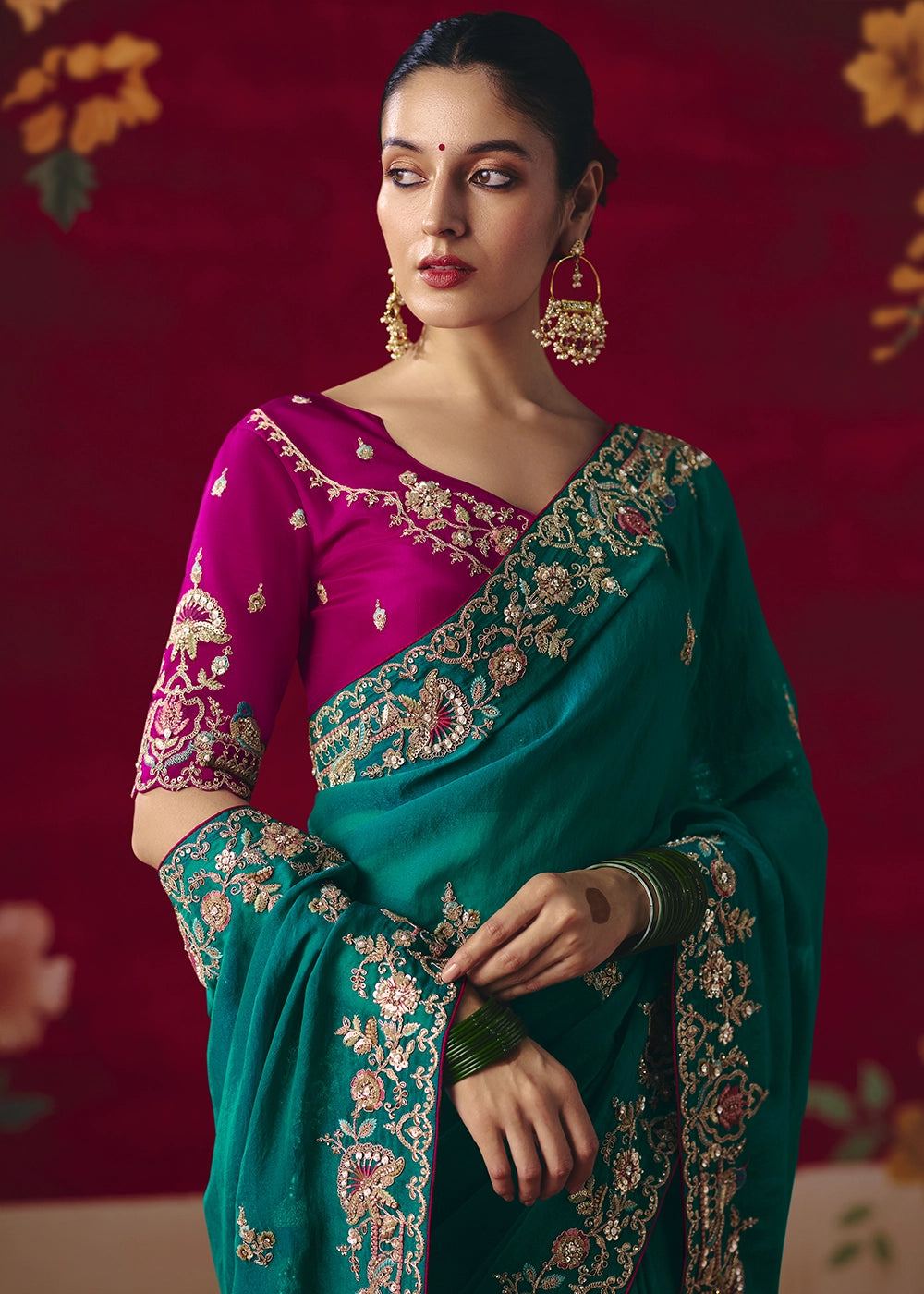 Teal Blue Tissue Silk Saree adorned with Sequins and Thread Embroidery