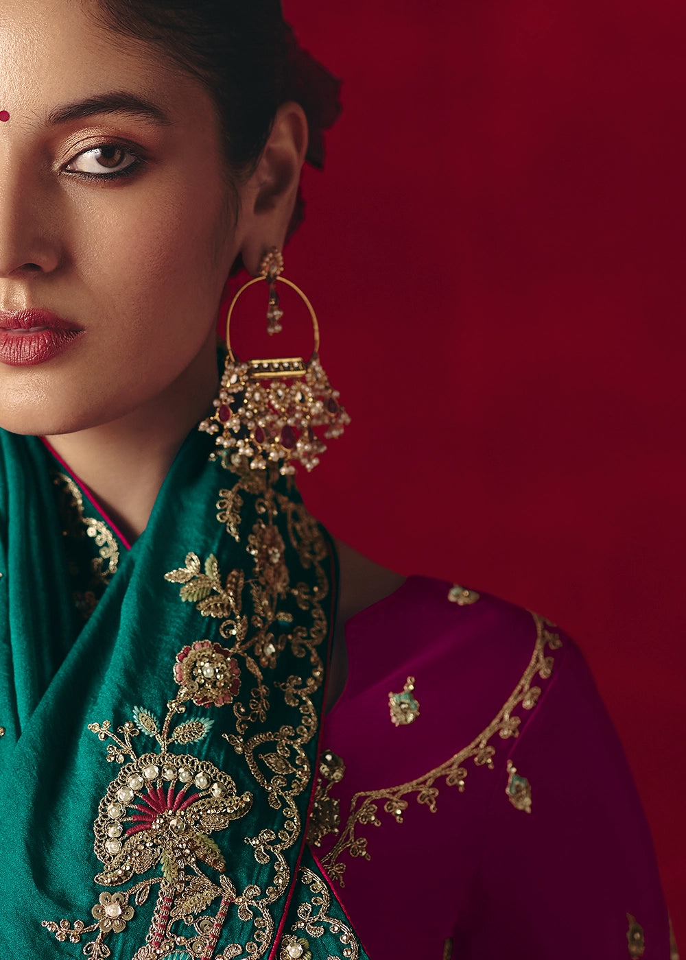 Teal Blue Tissue Silk Saree adorned with Sequins and Thread Embroidery