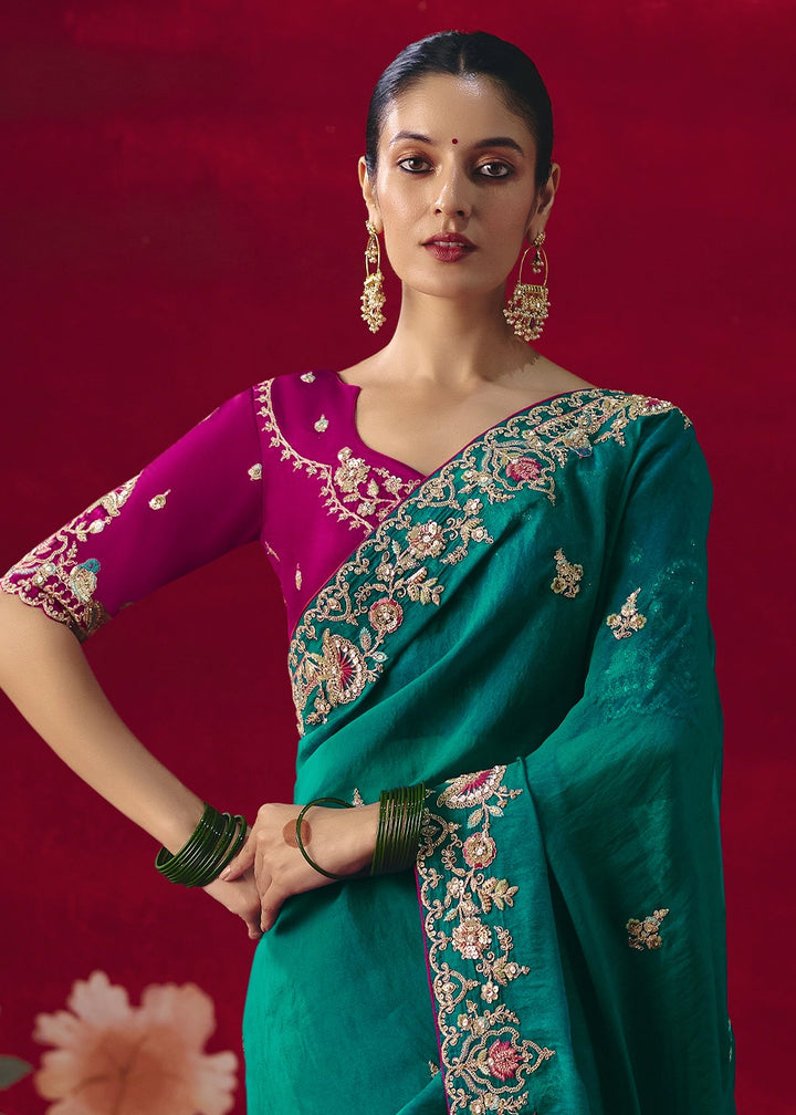 Teal Blue Tissue Silk Saree adorned with Sequins and Thread Embroidery