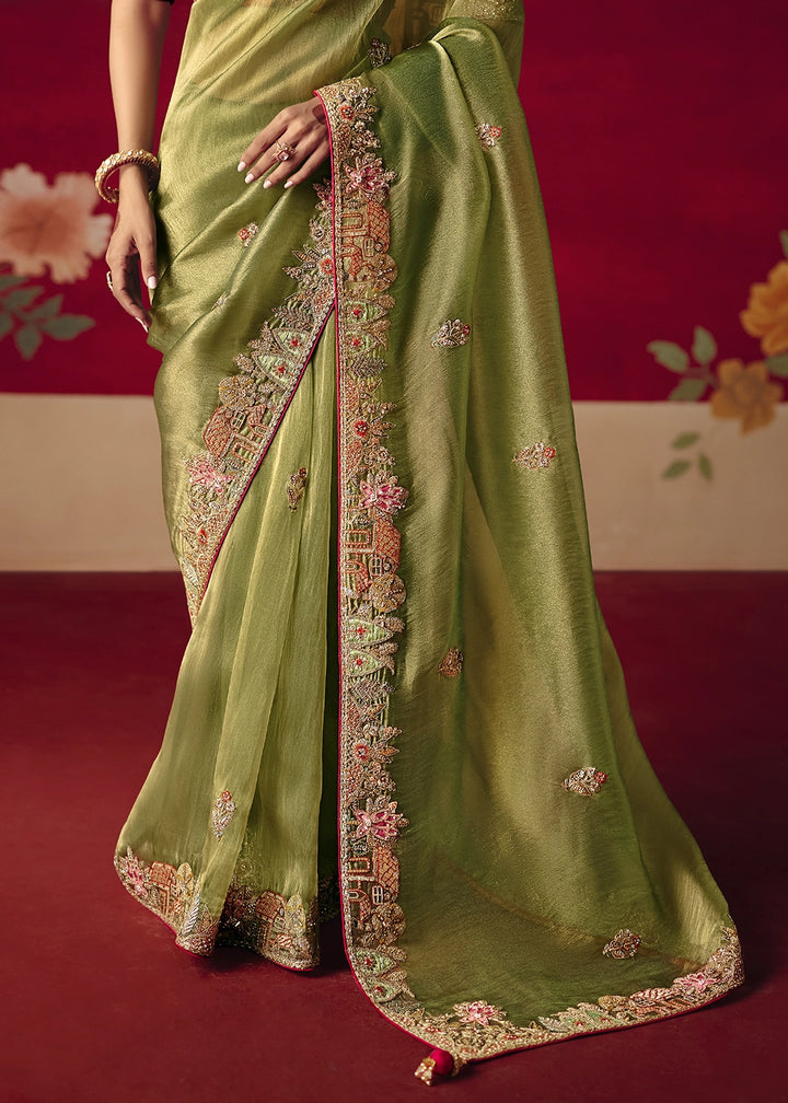 Pear Green Tissue Silk Saree adorned with Sequins and Thread Embroidery