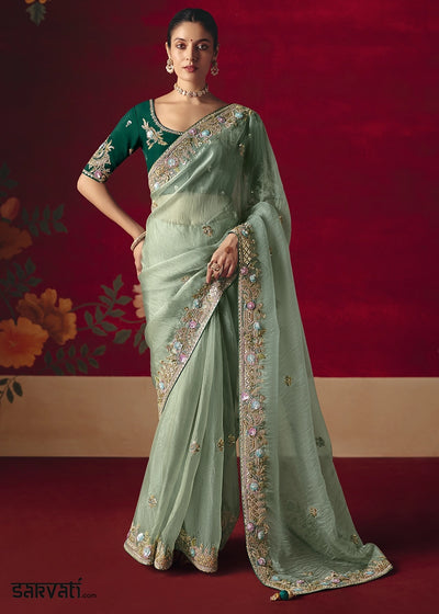 Tea Green Tissue Silk Saree adorned with Sequins and Thread Embroidery