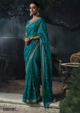 Teal Blue Tissue Silk Saree with Threadwork & Stone Accents