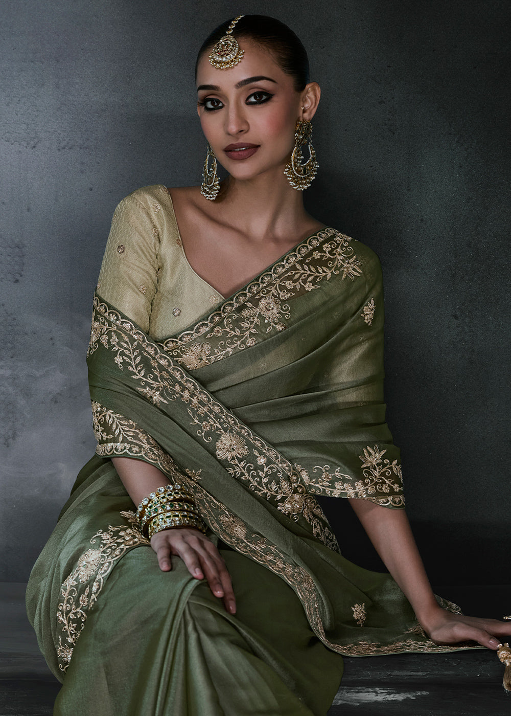 Dark Moss Green Organza Saree with Threadwork & Stone Accents