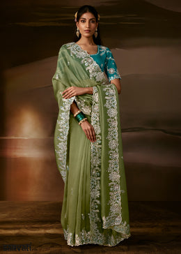 Sage Green Organza Saree Featuring Floral Zari and Sequin Embroidery