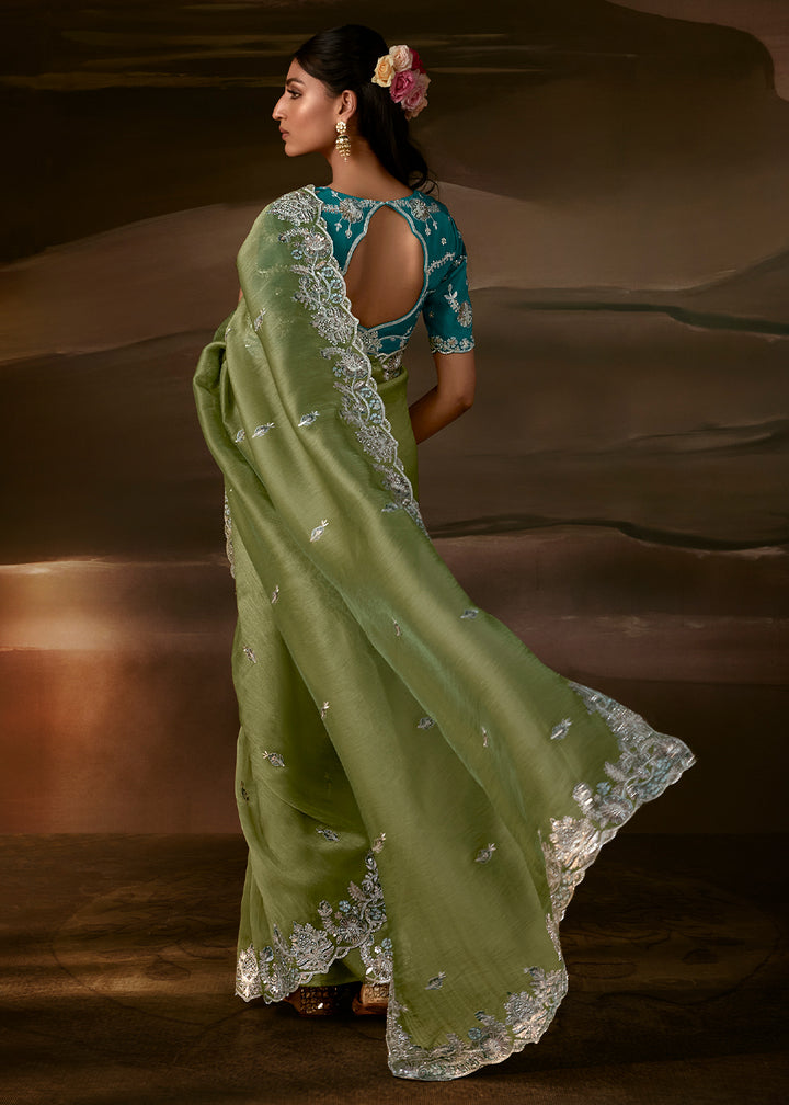 Sage Green Organza Saree Featuring Floral Zari and Sequin Embroidery