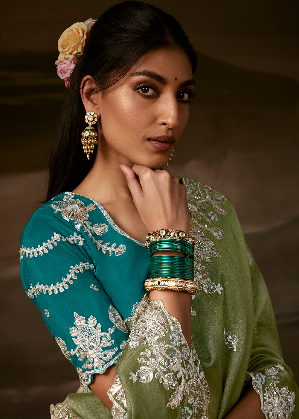 Sage Green Organza Saree Featuring Floral Zari and Sequin Embroidery