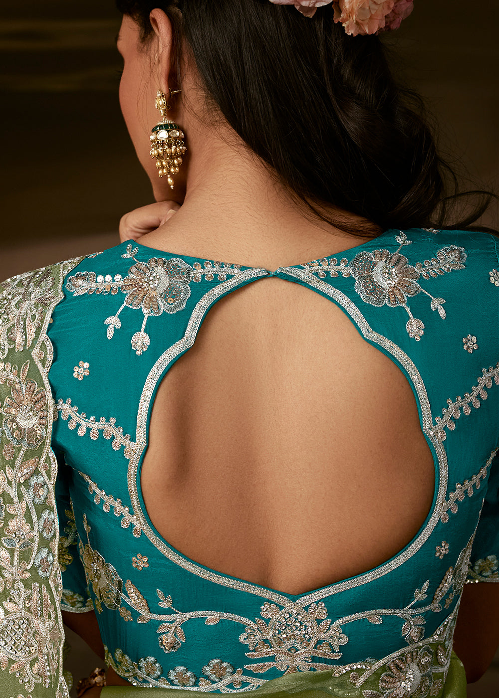 Sage Green Organza Saree Featuring Floral Zari and Sequin Embroidery
