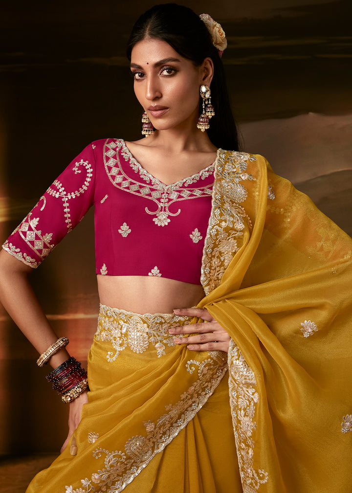 Golden Yellow Organza Saree Featuring Floral Zari and Sequin Embroidery