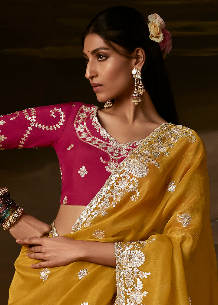 Golden Yellow Organza Saree Featuring Floral Zari and Sequin Embroidery