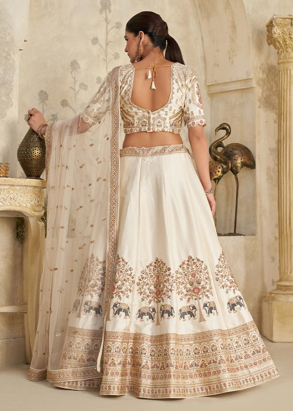 Ivory White Silk Lehenga Choli with Elephant Motifs & Zari Embroidery