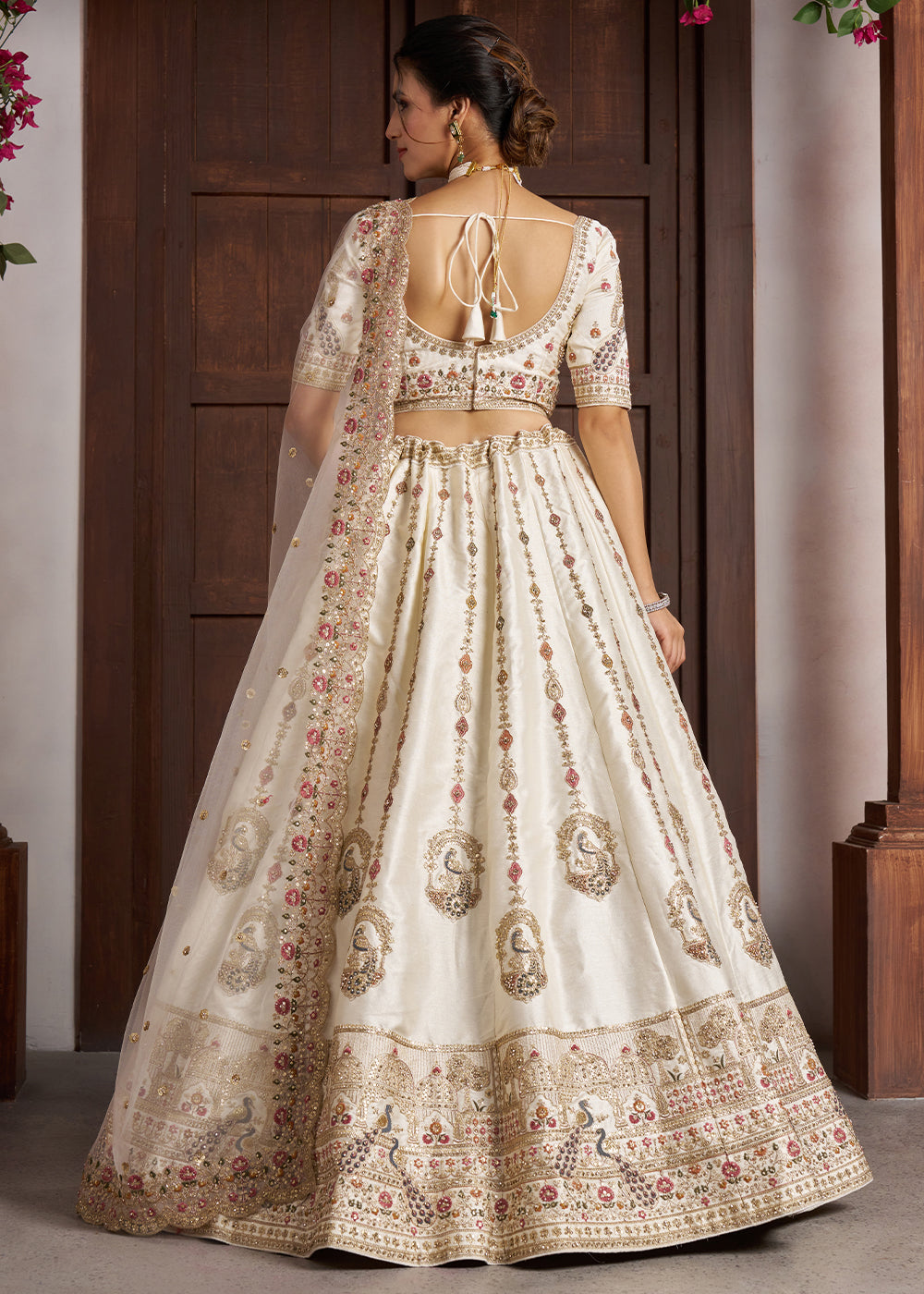 Pearl White Banarasi Silk Lehenga Choli with Intricate Peacock Motifs & Embroidery work