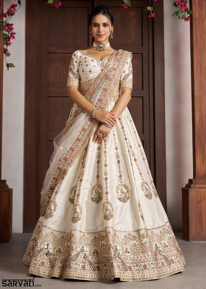 Pearl White Banarasi Silk Lehenga Choli with Intricate Peacock Motifs & Embroidery work