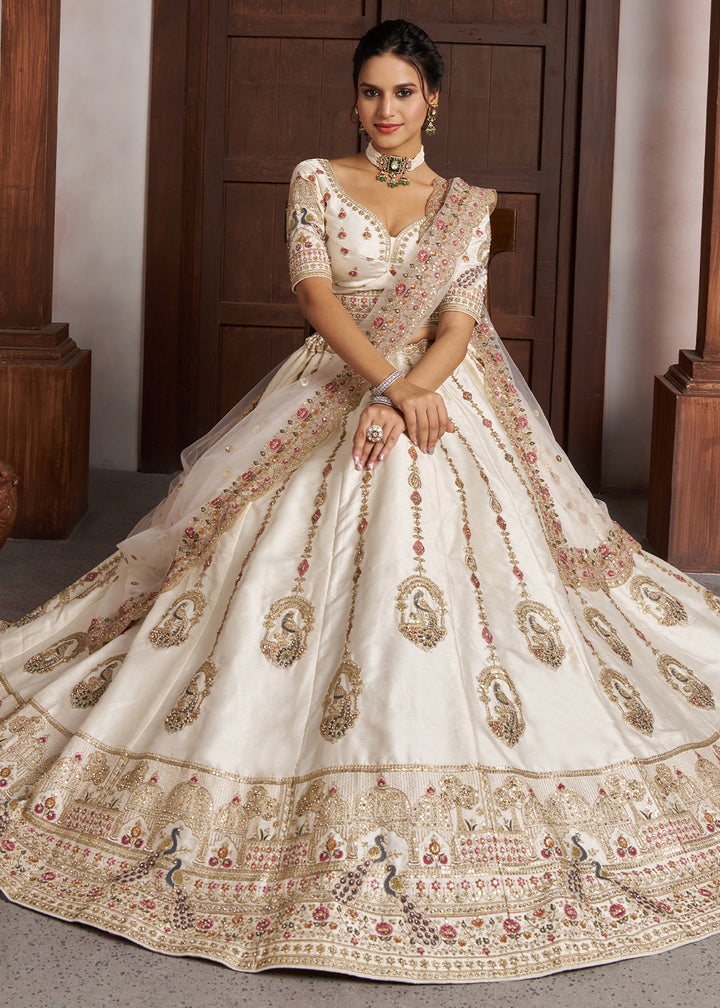 Pearl White Banarasi Silk Lehenga Choli with Intricate Peacock Motifs & Embroidery work