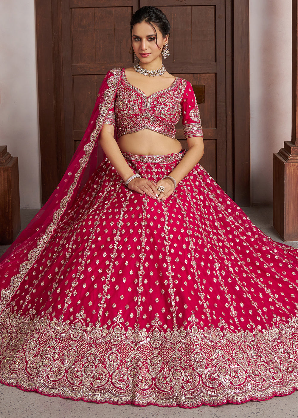 Magenta Pink Net Lehenga Choli with Silver Zari Artistry