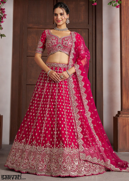 Magenta Pink Net Lehenga Choli with Silver Zari Artistry