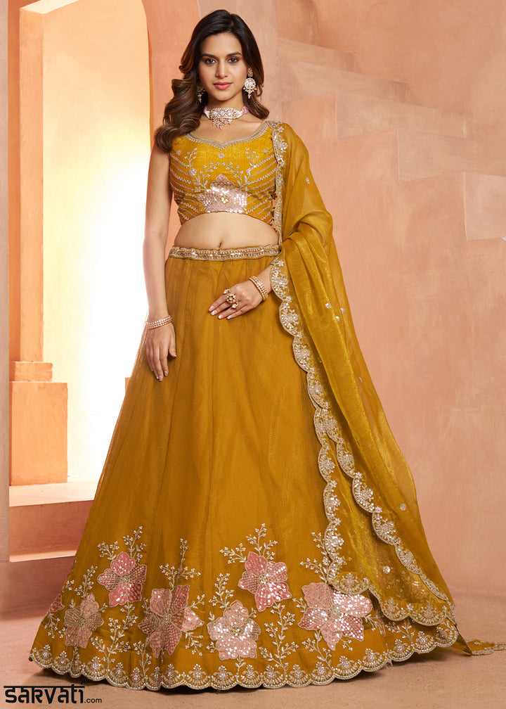 Mustard Yellow Tissue Lehenga Choli with Floral Motifs & Sequin Detailing