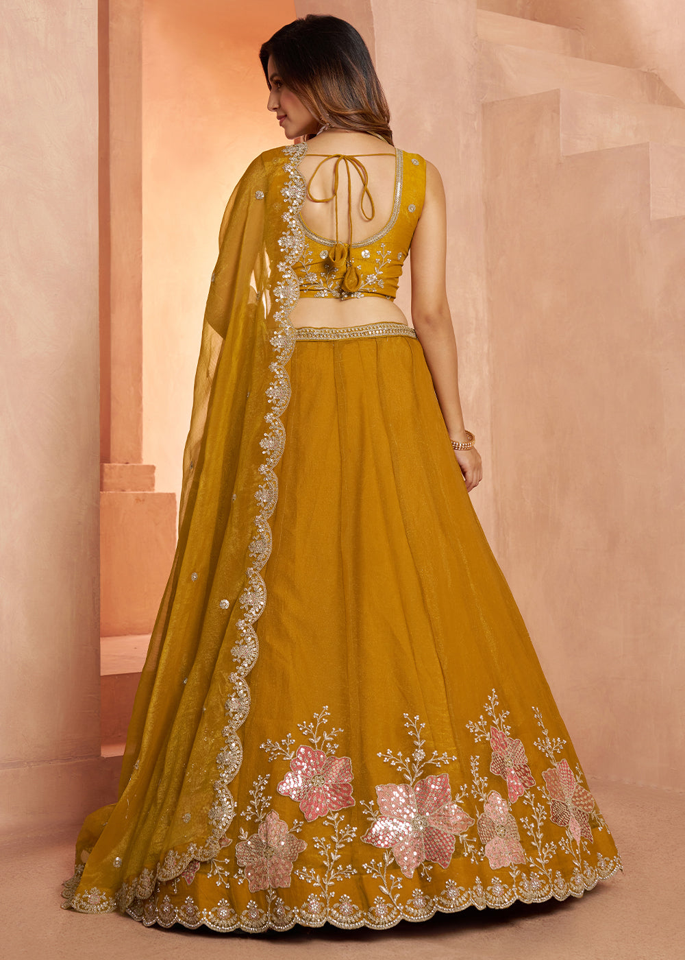Mustard Yellow Tissue Lehenga Choli with Floral Motifs & Sequin Detailing