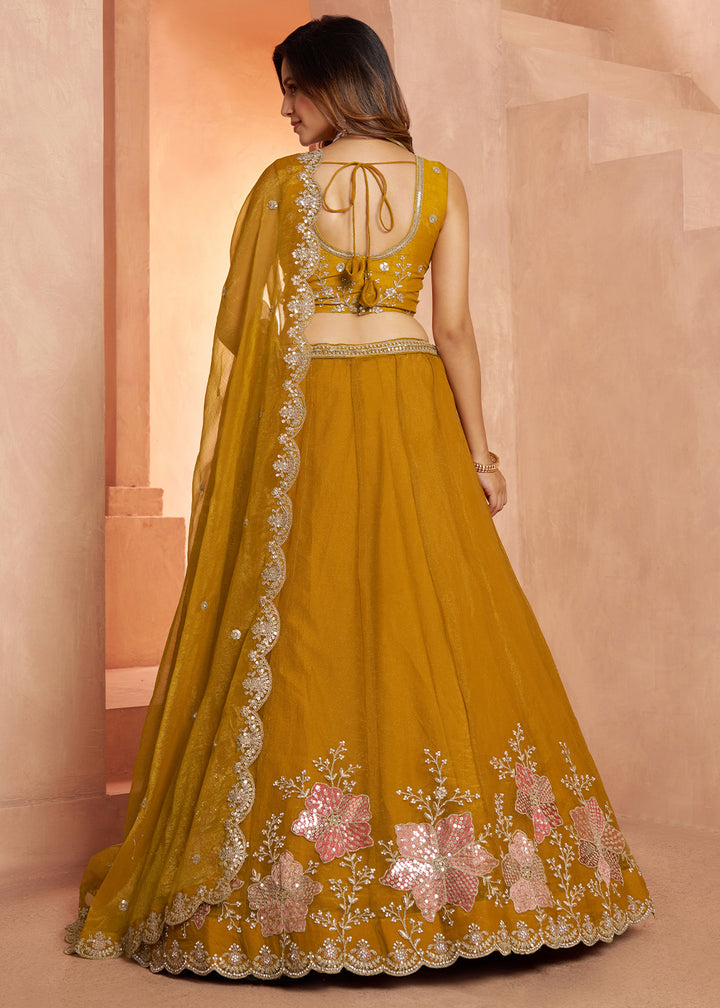 Mustard Yellow Tissue Lehenga Choli with Floral Motifs & Sequin Detailing