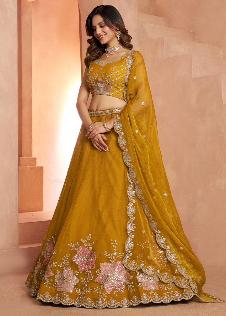 Mustard Yellow Tissue Lehenga Choli with Floral Motifs & Sequin Detailing