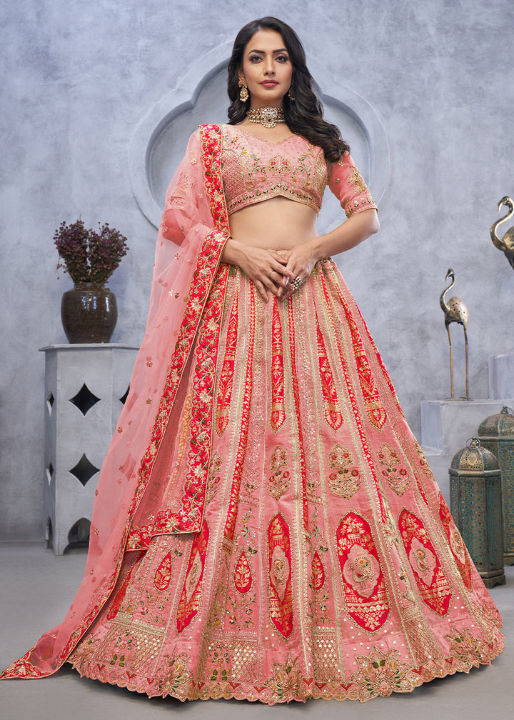 Light Peach Pink Lehenga Choli with Intricate Paisley Designs and Embroidery on Organza Silk