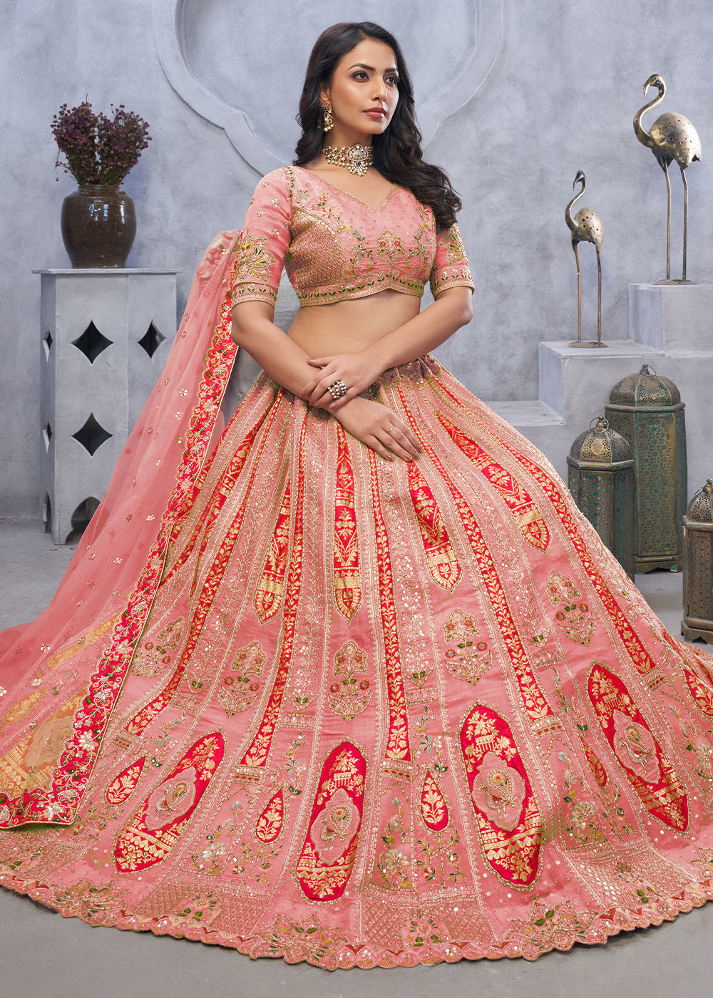 Light Peach Pink Lehenga Choli with Intricate Paisley Designs and Embroidery on Organza Silk