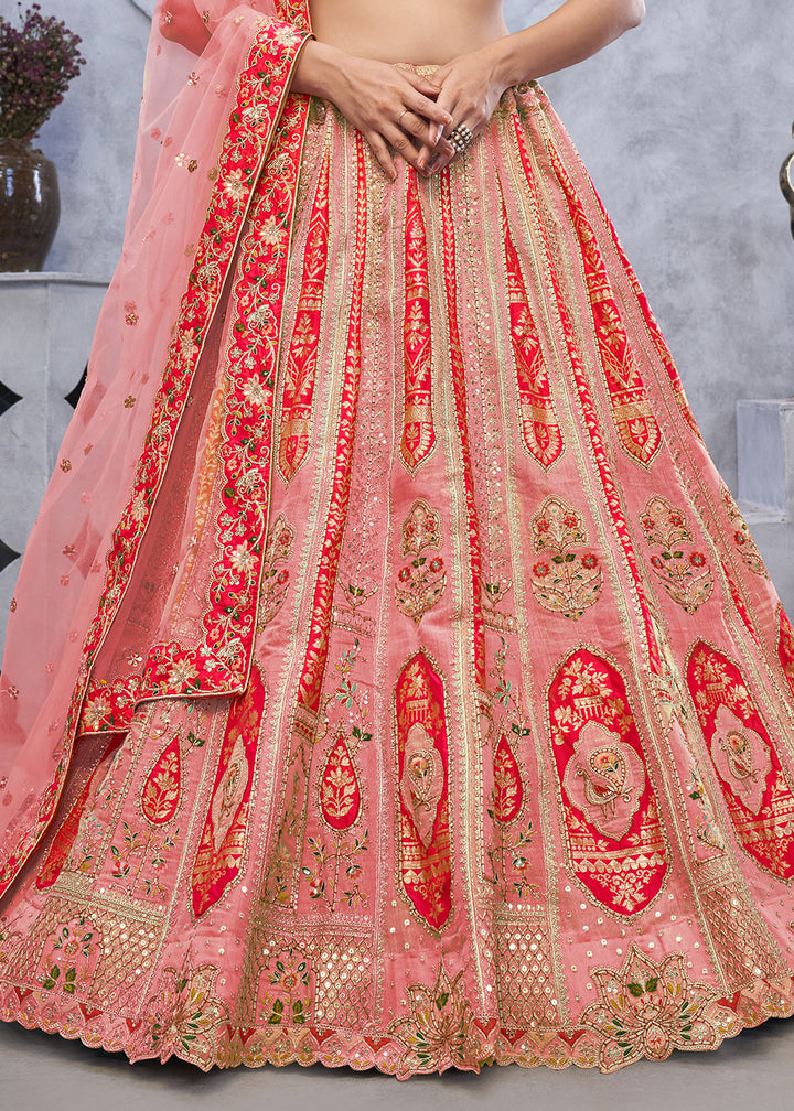 Light Peach Pink Lehenga Choli with Intricate Paisley Designs and Embroidery on Organza Silk