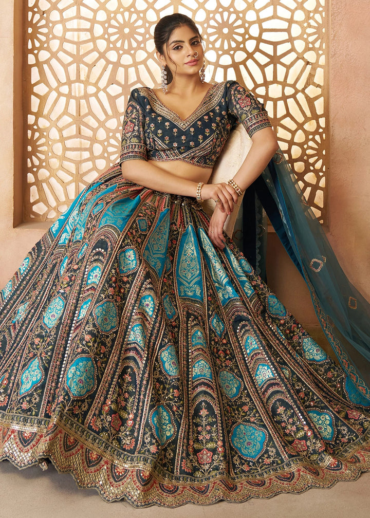 Shades Of Blue Banarasi Silk Lehenga Choli Embellished With Aari Work And Floral Detailing