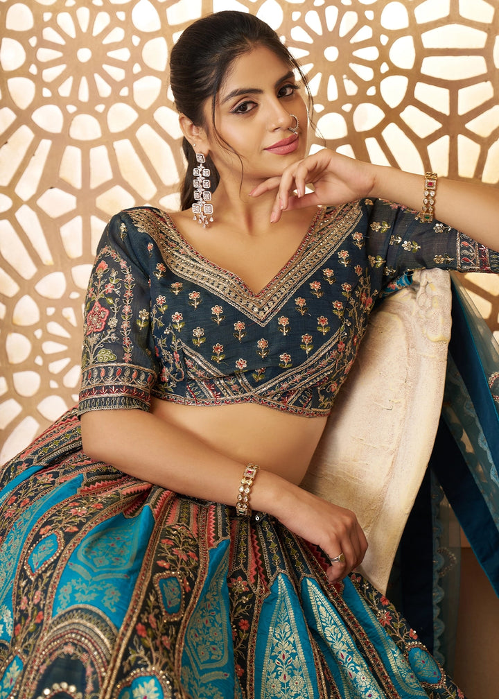 Shades Of Blue Banarasi Silk Lehenga Choli Embellished With Aari Work And Floral Detailing