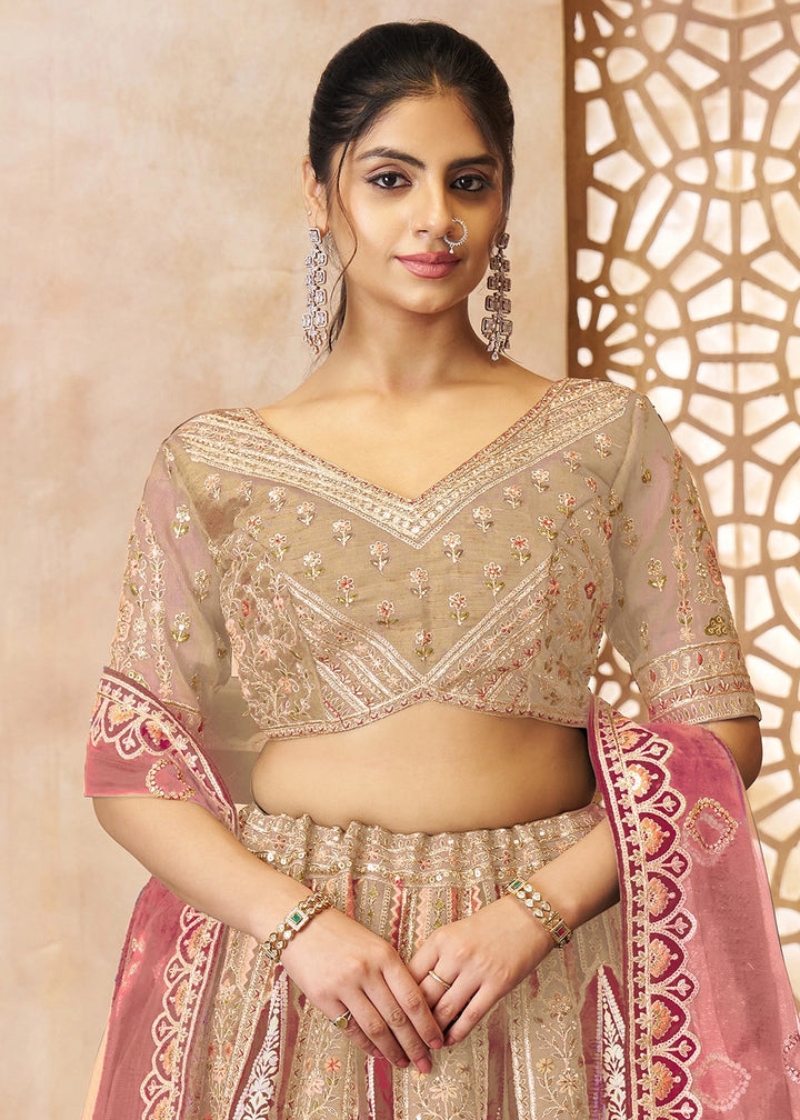 Shades Of Brown Banarasi Silk Lehenga Choli Embellished With Aari Work And Floral Detailing