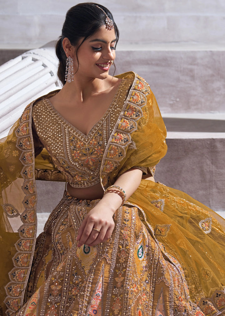 Mustard Yellow Banarasi Silk Lehenga Choli Embellished With Sequins, Aari Work And Floral Detailing