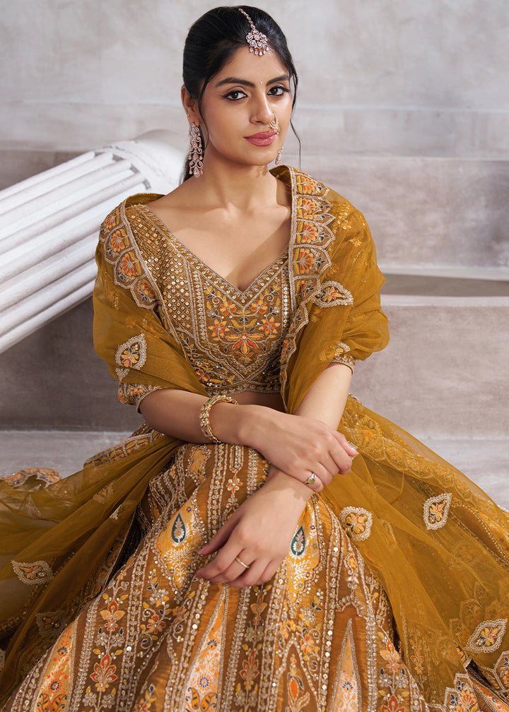 Mustard Yellow Banarasi Silk Lehenga Choli Embellished With Sequins, Aari Work And Floral Detailing