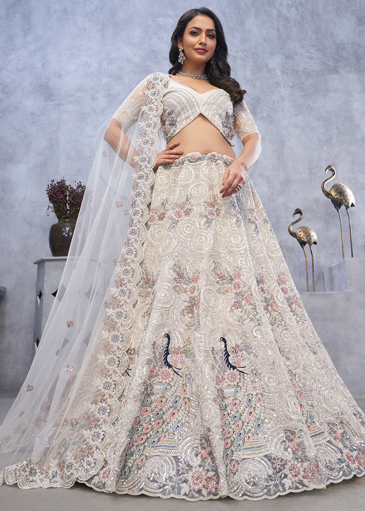 Ivory White Net Lehenga Choli – Embellished with Sequins, Stones, and Sitara