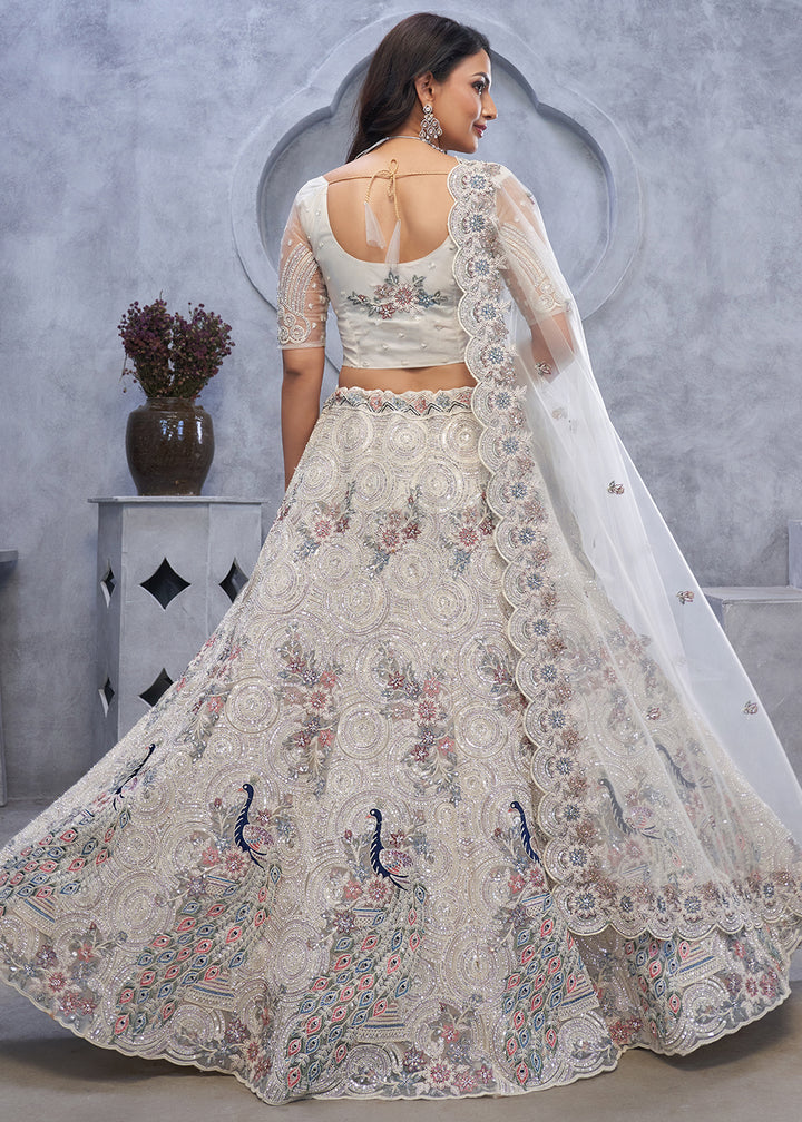 Ivory White Net Lehenga Choli – Embellished with Sequins, Stones, and Sitara