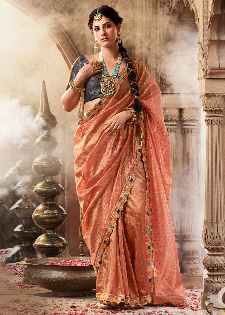 Shades Of Orange Pink Tissue Silk Saree Paired with Designer Blouse