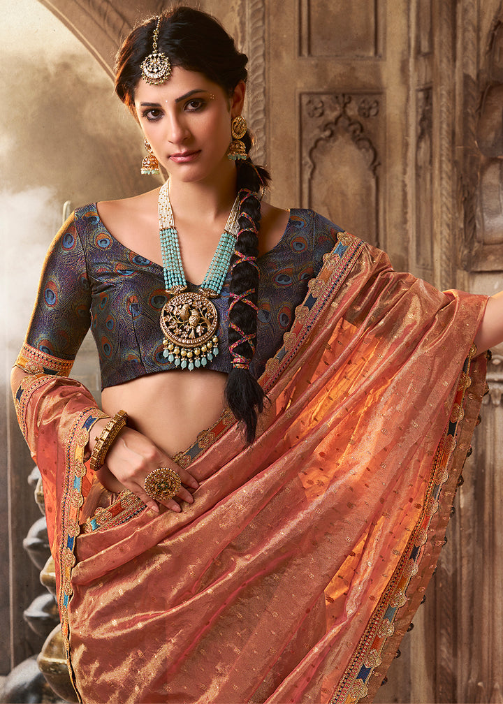 Shades Of Orange Pink Tissue Silk Saree Paired with Designer Blouse