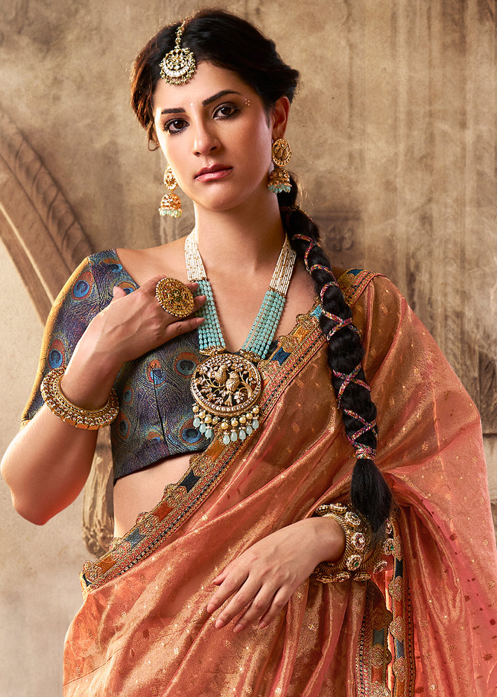 Shades Of Orange Pink Tissue Silk Saree Paired with Designer Blouse