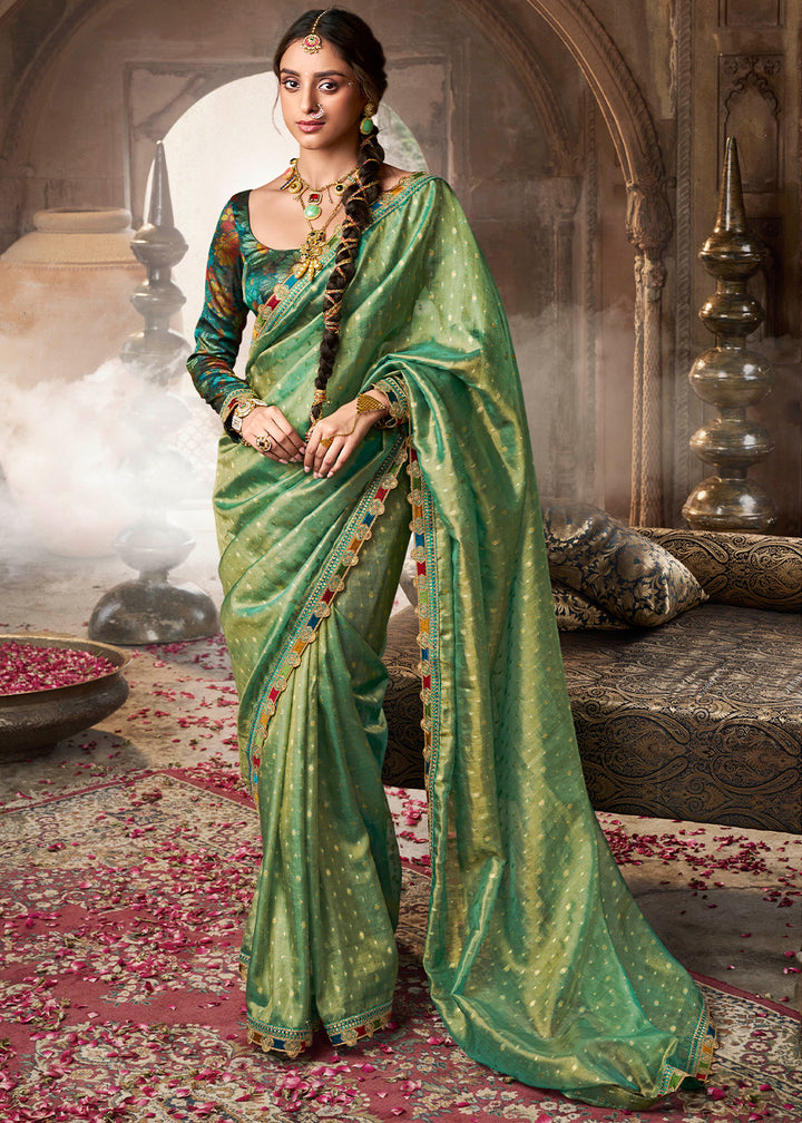 Shades Of Green Tissue Silk Saree Paired with Designer Blouse