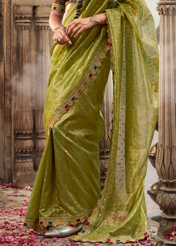 Shades Of Light Green Tissue Silk Saree Paired with Designer Blouse