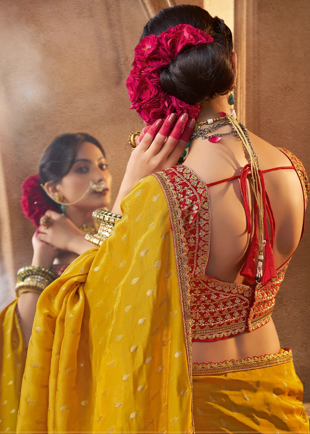 Saffron Yellow Butta Work Viscose Silk Saree Paired with Embroidered Blouse