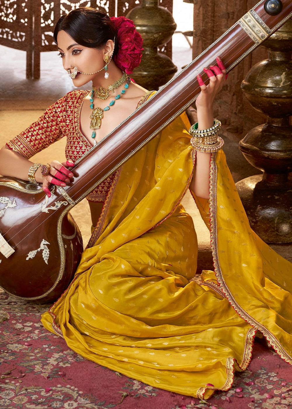 Saffron Yellow Butta Work Viscose Silk Saree Paired with Embroidered Blouse