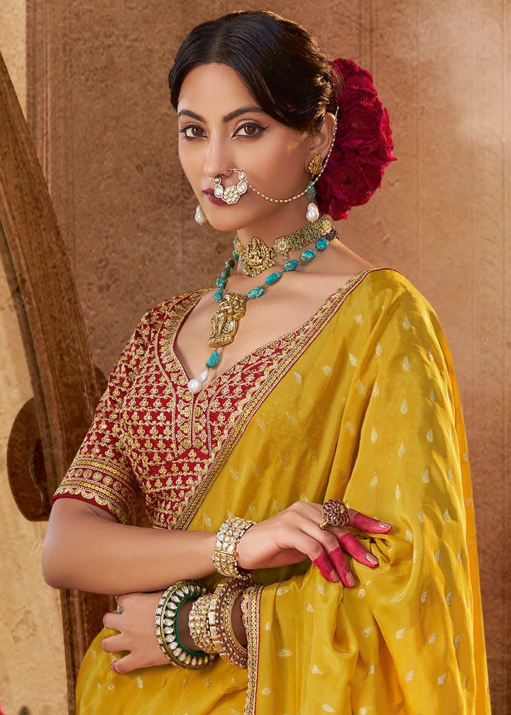 Saffron Yellow Butta Work Viscose Silk Saree Paired with Embroidered Blouse