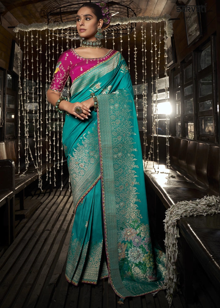Turquoise Blue Viscous Dola Silk Saree with Opulent Zari Work & Embellished Blouse