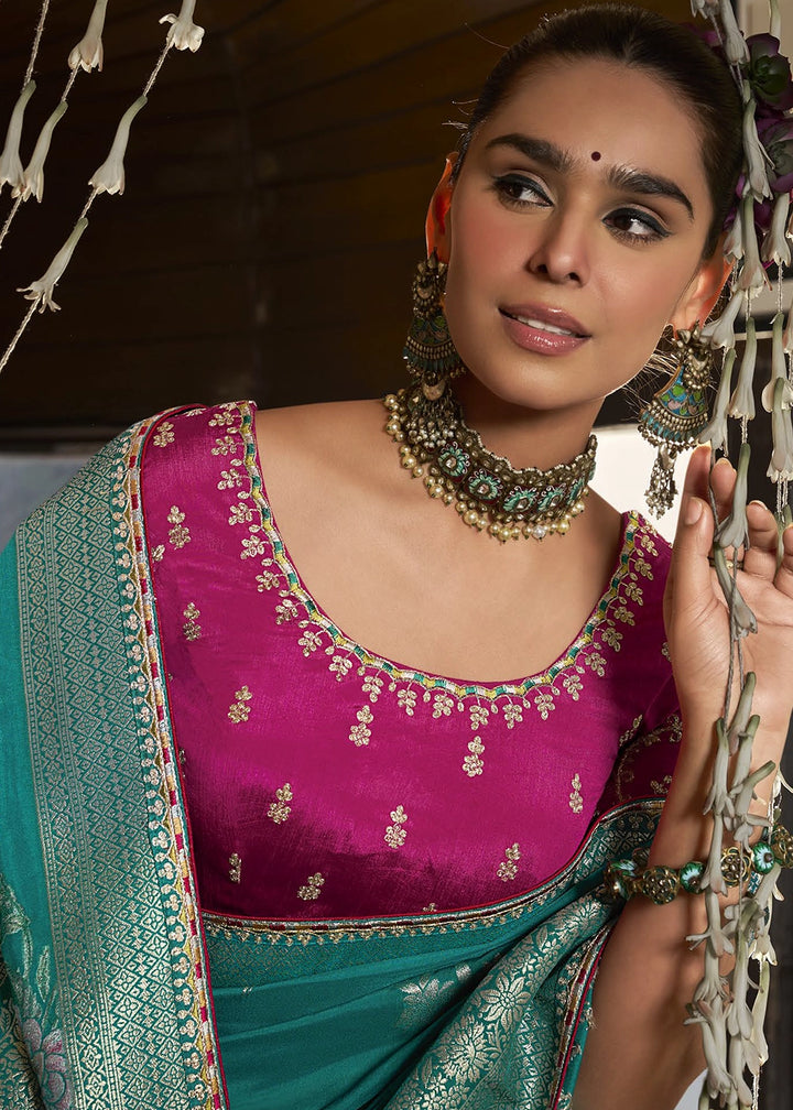 Turquoise Blue Viscous Dola Silk Saree with Opulent Zari Work & Embellished Blouse