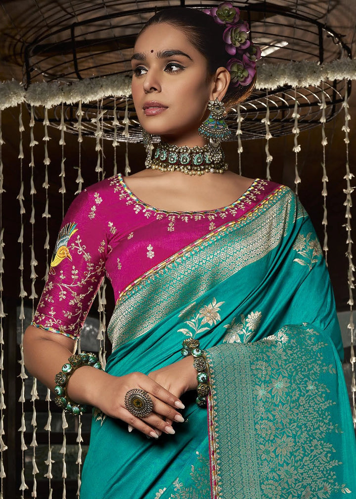 Turquoise Blue Viscous Dola Silk Saree with Opulent Zari Work & Embellished Blouse