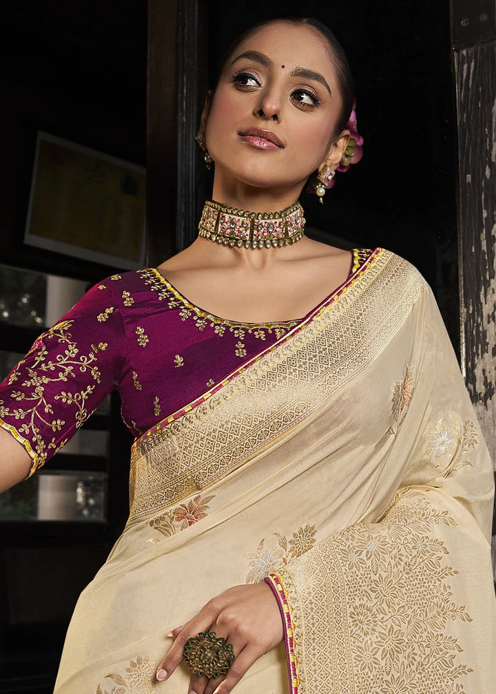 Cream White Viscous Dola Silk Saree with Opulent Zari Work & Embellished Blouse