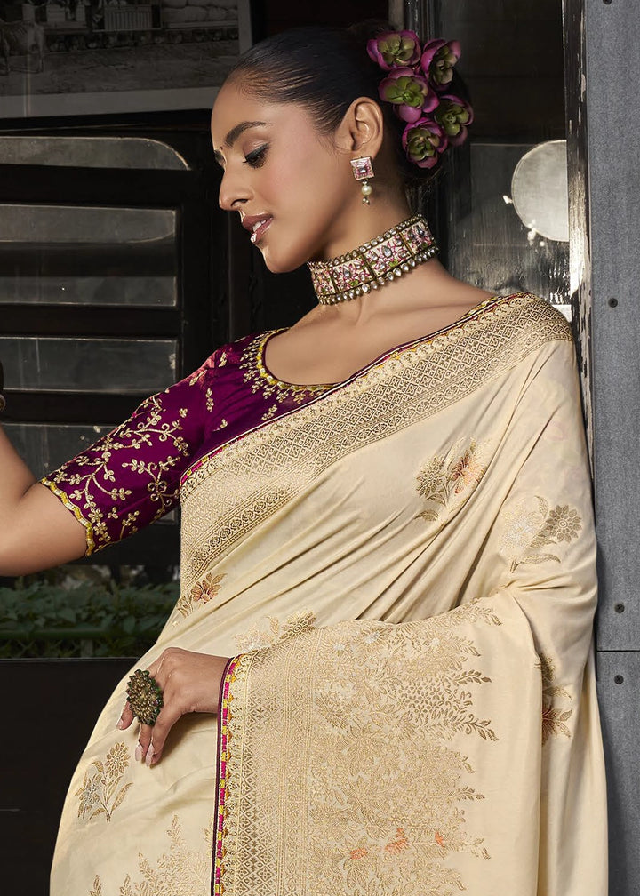 Cream White Viscous Dola Silk Saree with Opulent Zari Work & Embellished Blouse