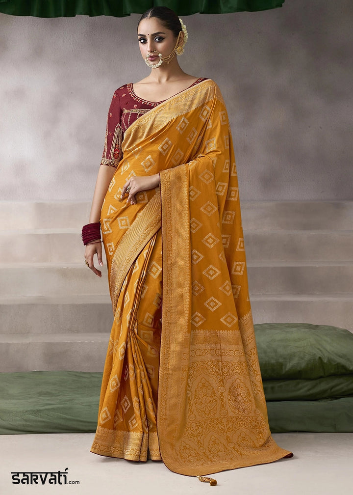 Pumpkin Orange Crepe Silk Saree with Contrast Embroidered Blouse
