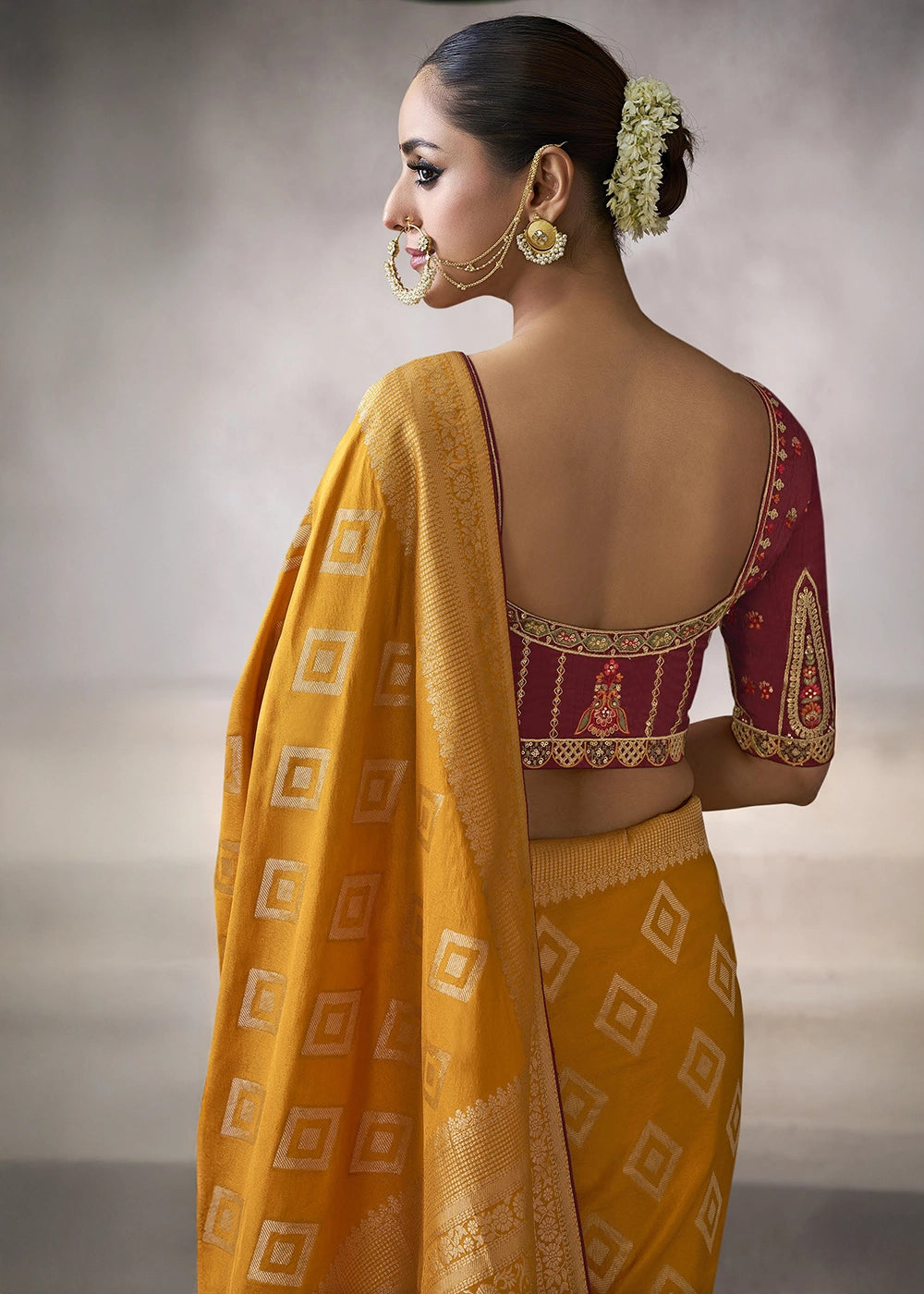 Pumpkin Orange Crepe Silk Saree with Contrast Embroidered Blouse