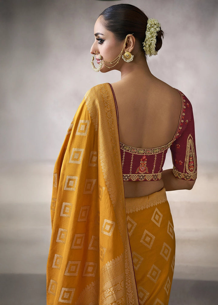 Pumpkin Orange Crepe Silk Saree with Contrast Embroidered Blouse